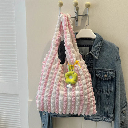 Women's pleated bubble crossbody bag in vertical square shape with pendant accessory