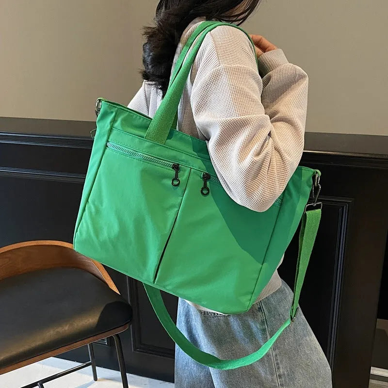 Large capacity solid colour Oxford cloth messenger bag with breathable ultra-light design