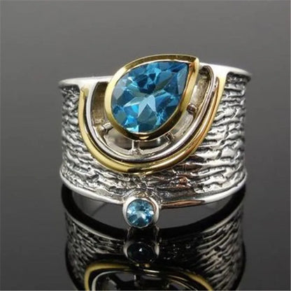 Creative Chinese style adjustable alloy ring with a drop-shaped inlaid blue rhinestone zircon.