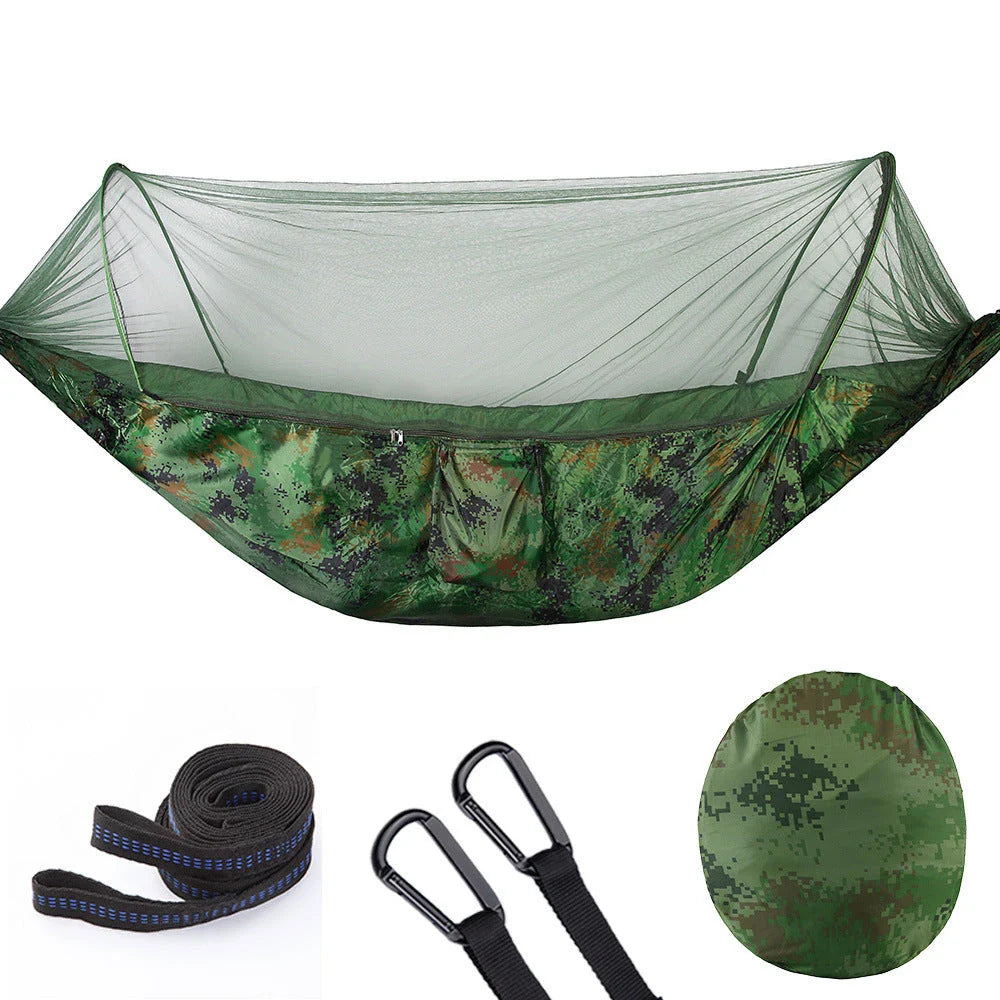 Cozy outdoor hammock with mosquito net for relaxing in nature and outdoor adventures