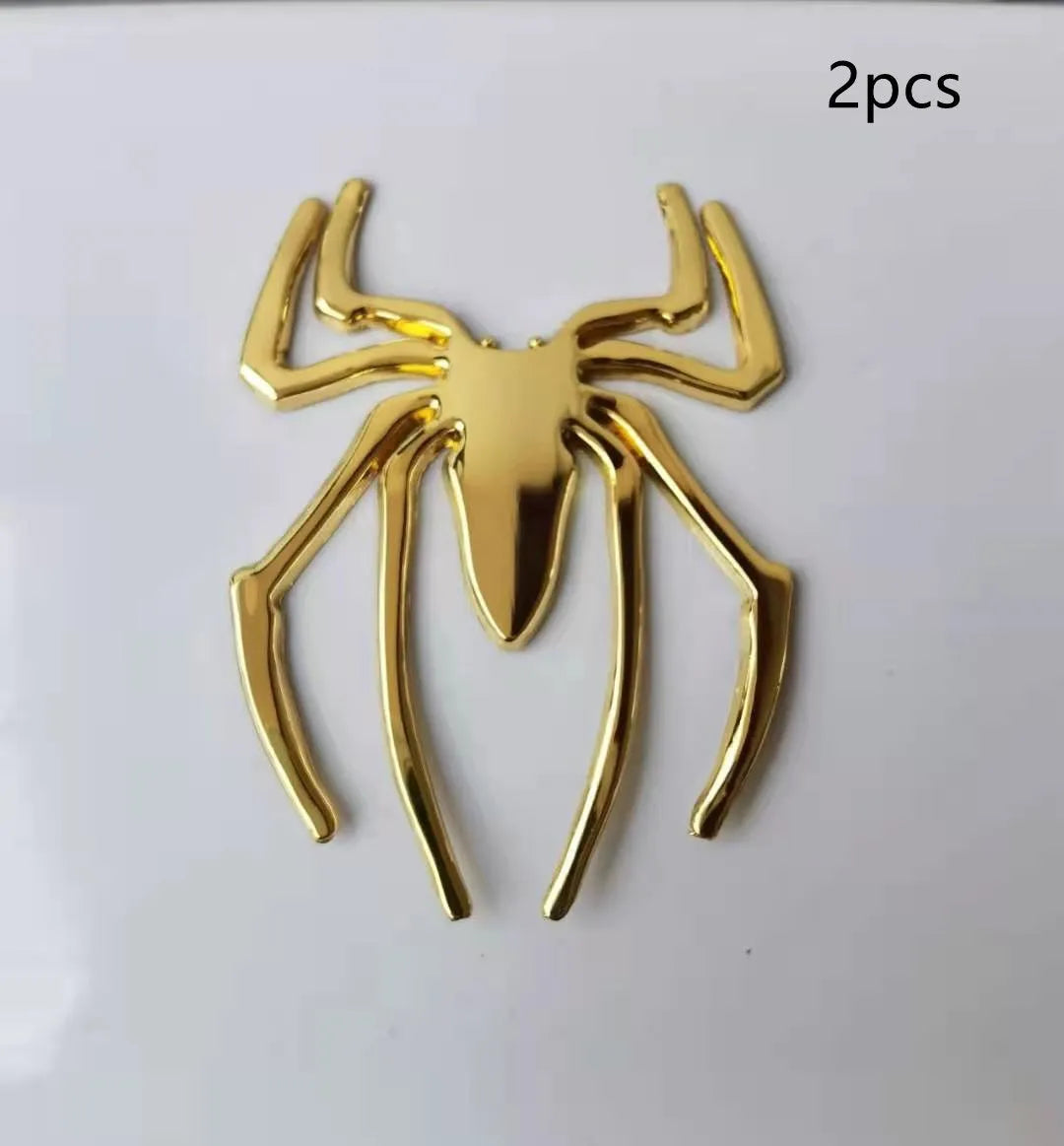 Three-dimensional metal spider bumper sticker in zinc alloy measuring 7cm by 5cm