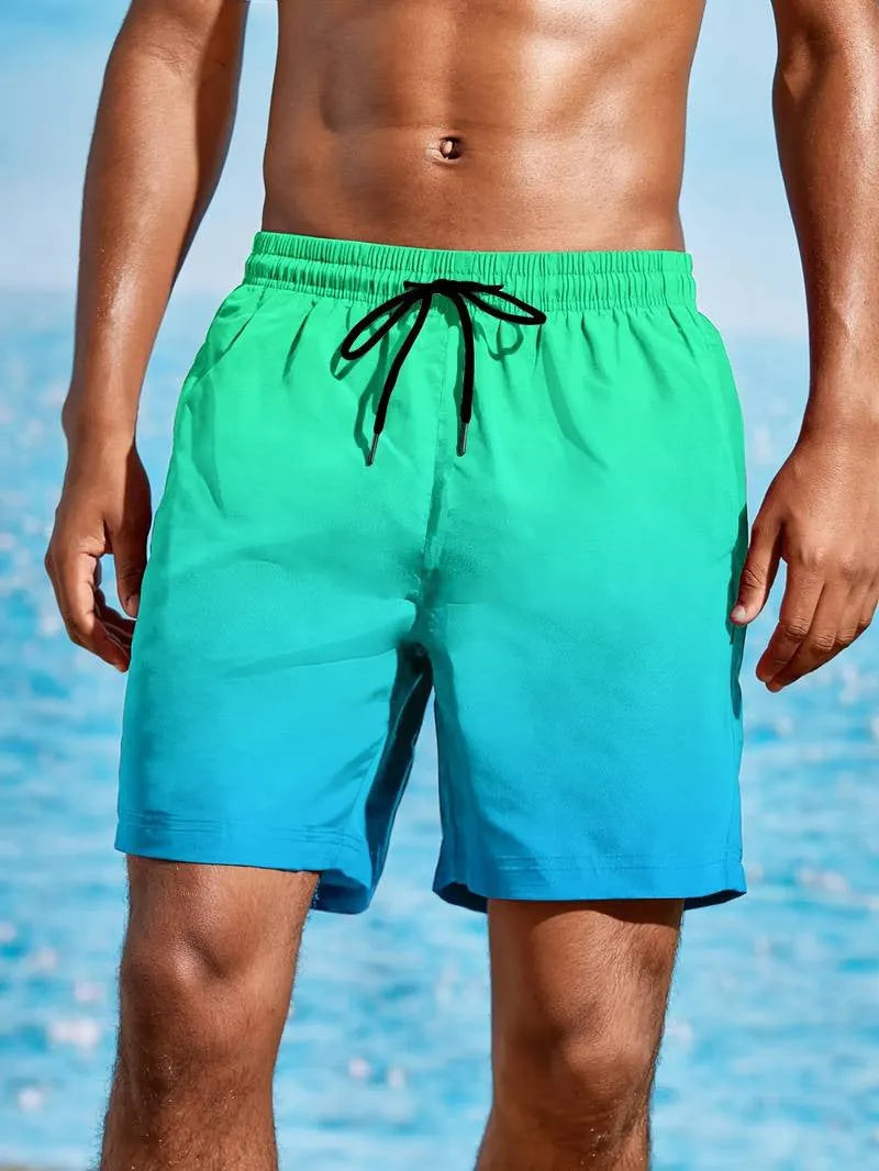 Men's grey gradient 3D print mesh sports shorts on a white background, showing shorts length and fabric texture.