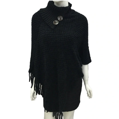 Sleeveless polka dot shawl in apricot colour draped over chair, showing 150cm length and acrylic fibre texture