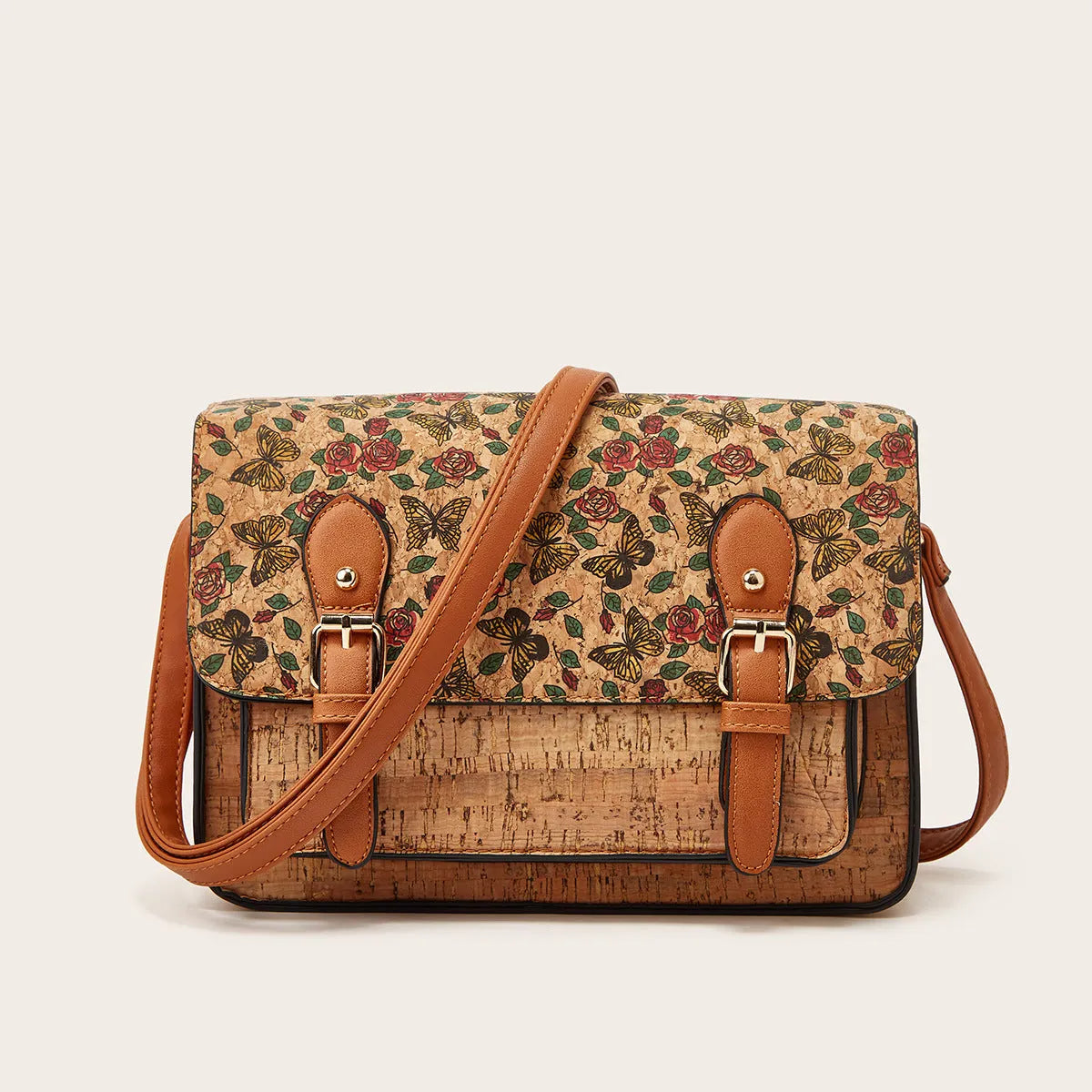 Women's one-shoulder crossbody bag with printed design in green colour, showing large capacity and single strap.