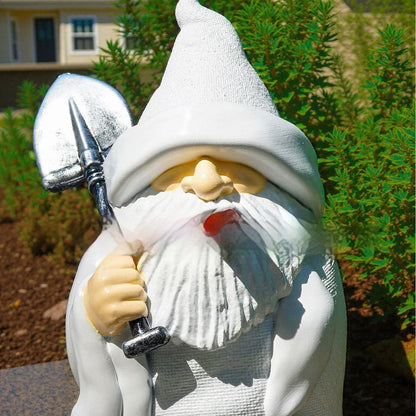 Resin Christmas garden ornament showing dwarf holding smoking shovel, 8cm height