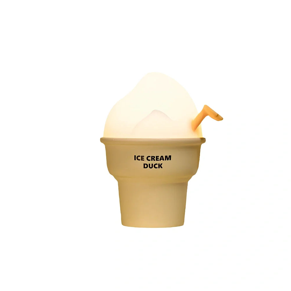 Abstract duck night lamp with ice cream colours measuring 103mm tall with USB charging port