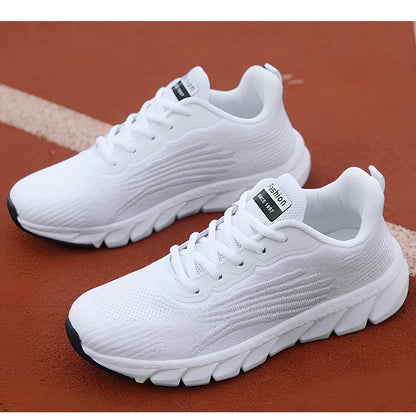 Women's black running sneakers with MD soles and cross strap detailing for jogging