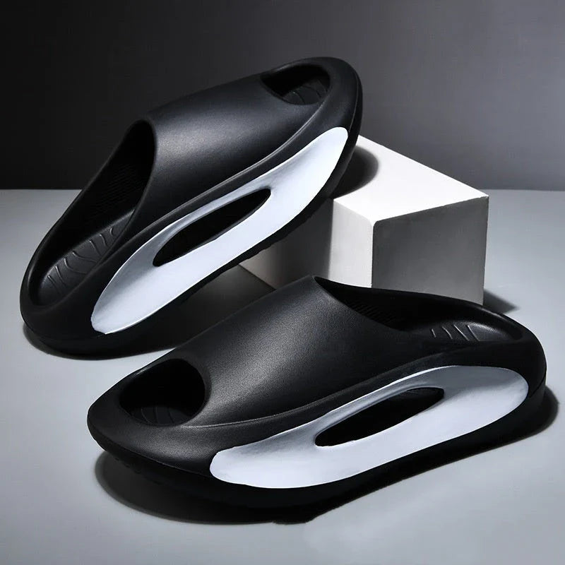 Stylish and comfortable unisex slippers with a unique hollow design, perfect for summer beach and casual wear