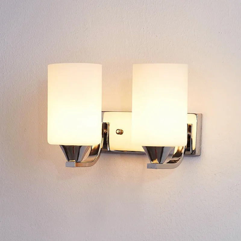 Minimalist chrome glass wall lamp with adjustable light colours for bedside illumination