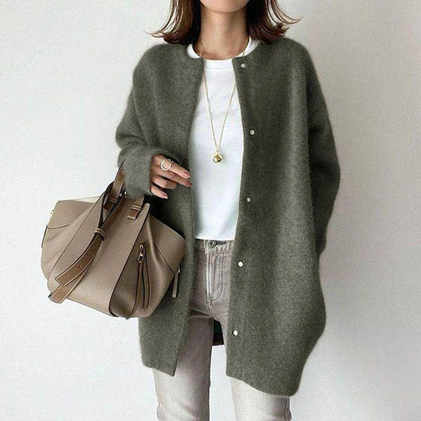 A cozy, knitted cardigan jacket in a variety of colors and sizes, featuring a relaxed open-front silhouette and premium construction for versatile layering.