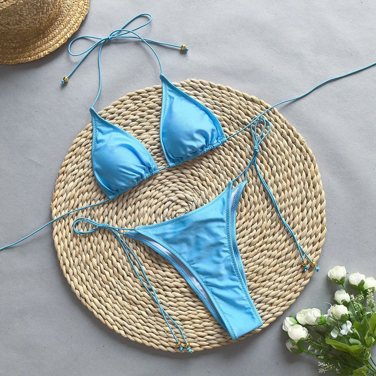 Ladies solid colour two-piece bikini set with briefs style and nylon spandex lining, available in S M L