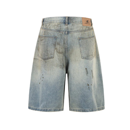Blue denim cropped middle pants with straight-leg style and zipper fly closure on a street fashion background