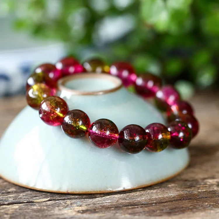 Women's personalised bracelet with hand-threaded watermelon crystal beads.