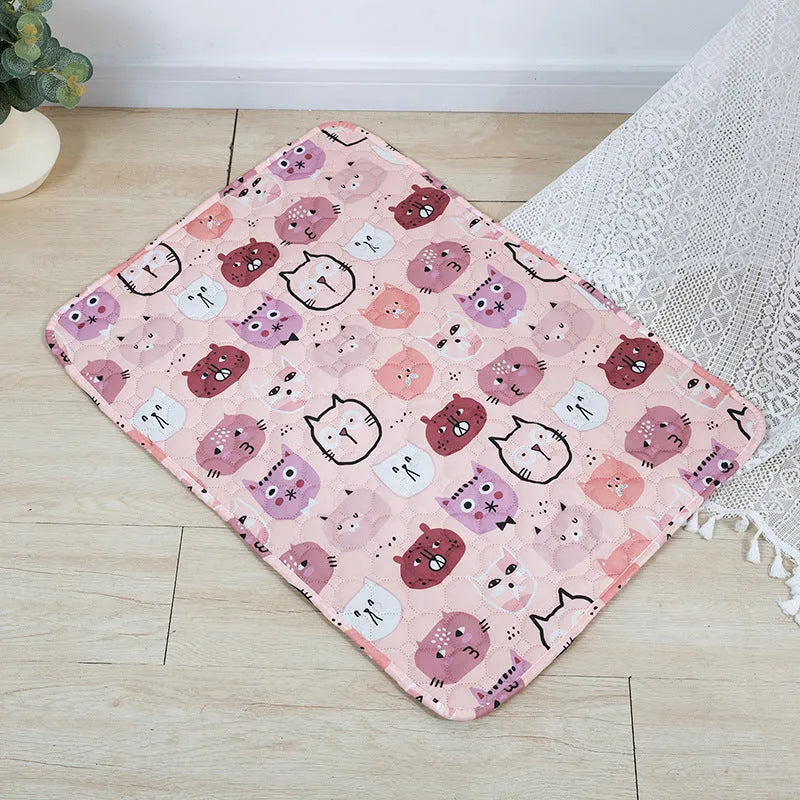 Reusable cloth pet urine pad with animal print and waterproof non-slip backing in various sizes.