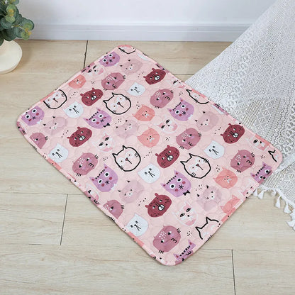 Reusable cloth pet urine pad with animal print and waterproof non-slip backing in various sizes.