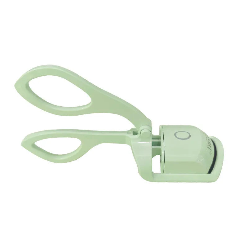 Pink heated electric eyelash curler with USB charging port and curved design with silicone pads