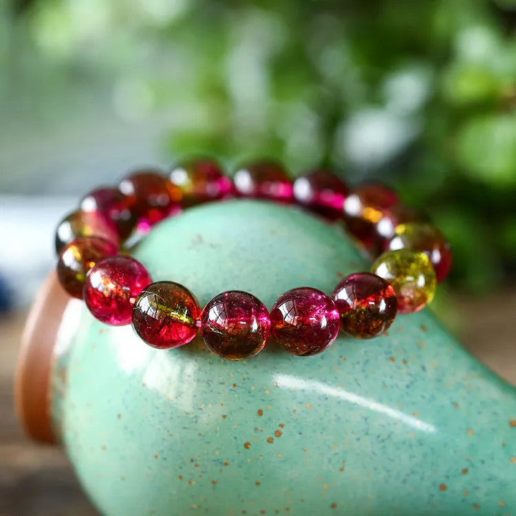 Women's personalised bracelet with hand-threaded watermelon crystal beads.