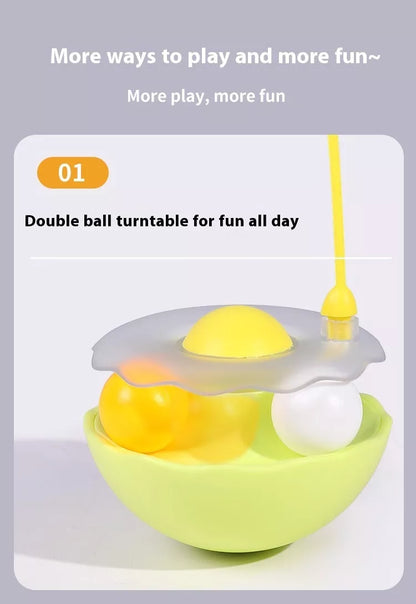 Interactive cat toy with catnip, feather wand, and spinning balls in white, indigo, fluorescent yellow, and pink