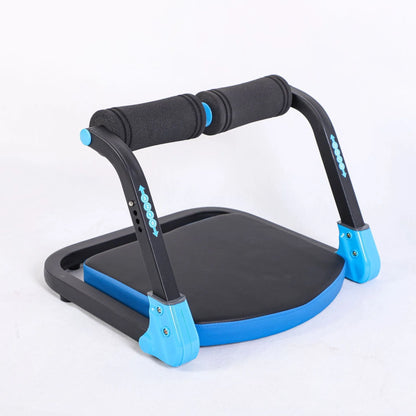 Sky blue and red compact abdominal exercise device with a 23cm diameter on a plain background.