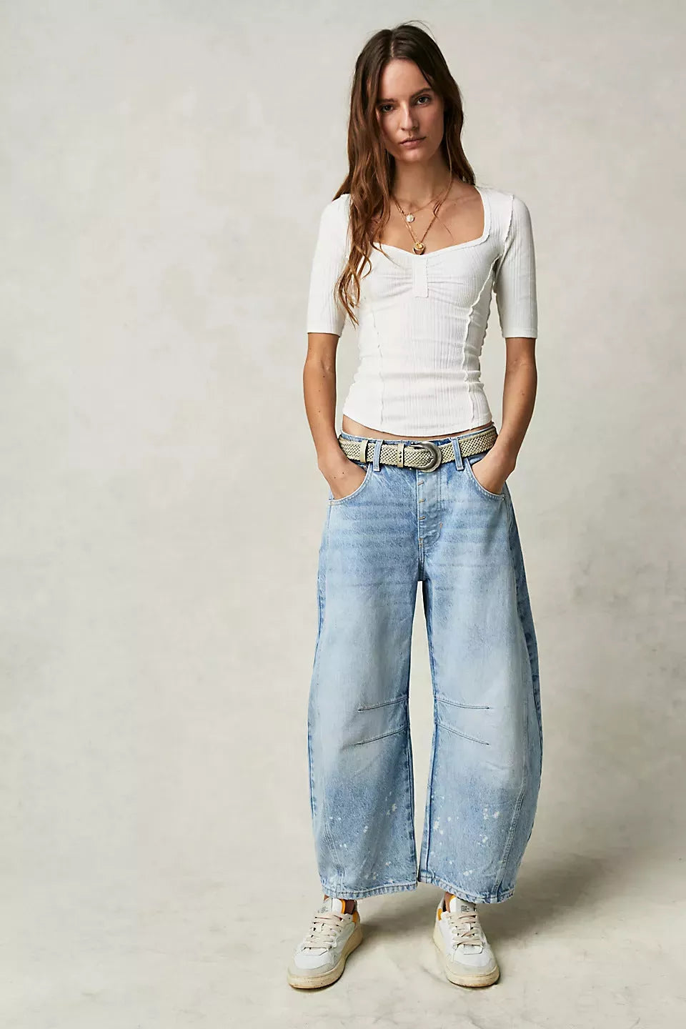 Women's mid-rise barrel jeans with wide leg design in various colors