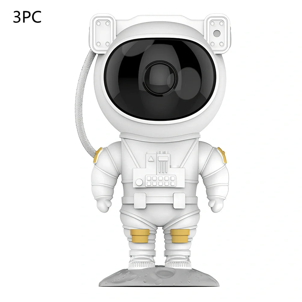 Astronaut-themed galaxy projector with adjustable nebula effects on table showing starry sky projection