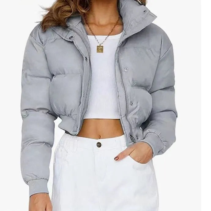 Women's loose leisure warm polyester jacket in long sleeve regular cut available in blue, grey, black, and Milky White colour options with sizes XS, S, M, L designed for a relaxed fit and everyday casual wear.