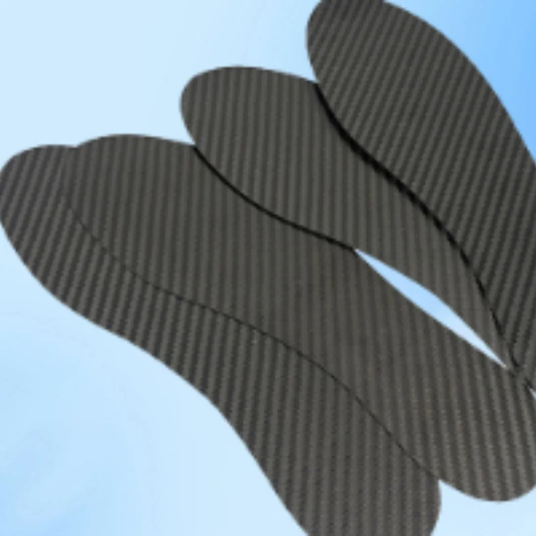 A pair of flat, black 3K full palm carbon fibre running insoles showing the textured weave.