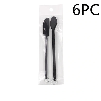 Retractable silicone cosmetic spatula extended to 15cm with scraper tool for product application
