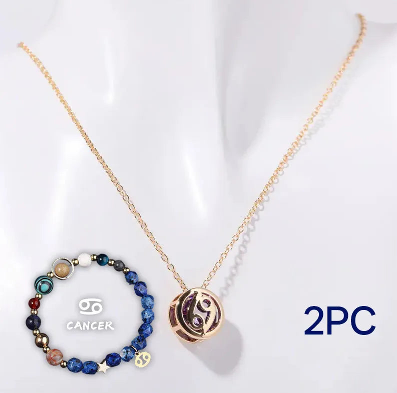 A natural stone beaded necklace and matching adjustable bracelet laid flat.