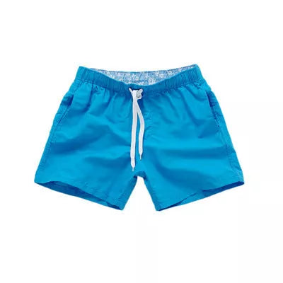 Men's summer surf shorts in various colors, made from 100% polyester for quick drying and durability