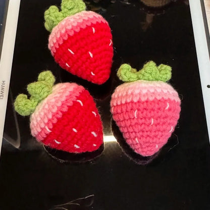 Red and pink plush strawberry pendant keychains with soft texture