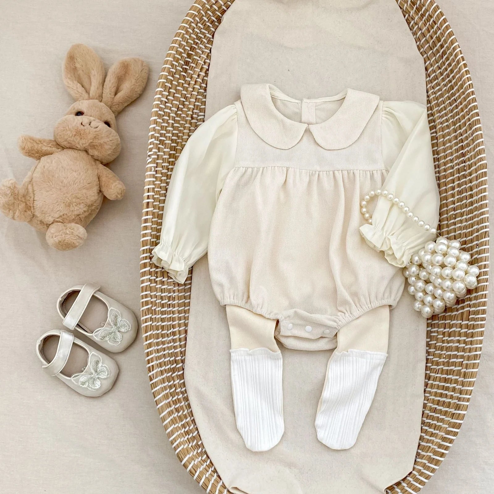 Corduroy doll collar long sleeve baby romper in black or apricot with single-breasted closure