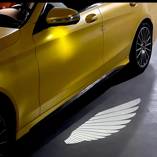 Universal car rearview mirror angel wings projection courtesy lamp with aluminium housing.