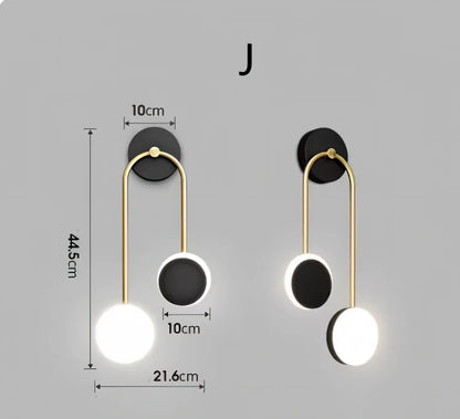 Nordic wall lamp with black gold finish and LED lighting, mounted beside bed with dimming controls