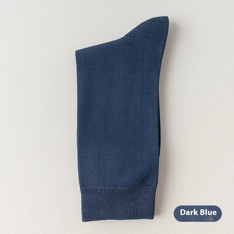 Mid-calf business socks in solid colours with combed cotton construction and deodorant function