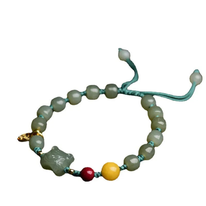 Natural Hetian jade cinnabar beeswax bracelet with animal zodiac modelling and 5x7mm beads