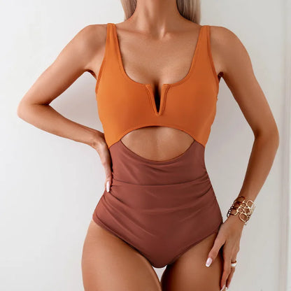 Women's one-piece swimsuit in a contrast colour design, available in black, brown, dark pink, and green.