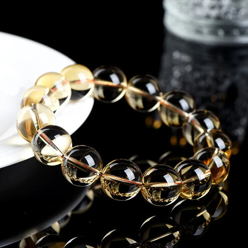 Natural citrine scattered beads bracelet showing adjustable design with polished gemstone beads in amber tones