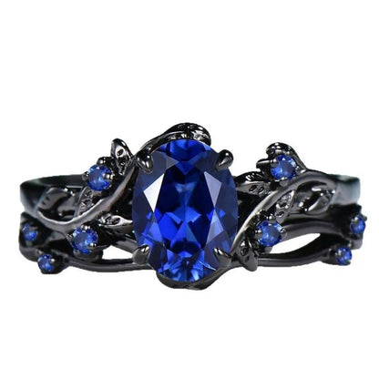 Geometric gun black couple ring with navy blue rhinestones on copper base