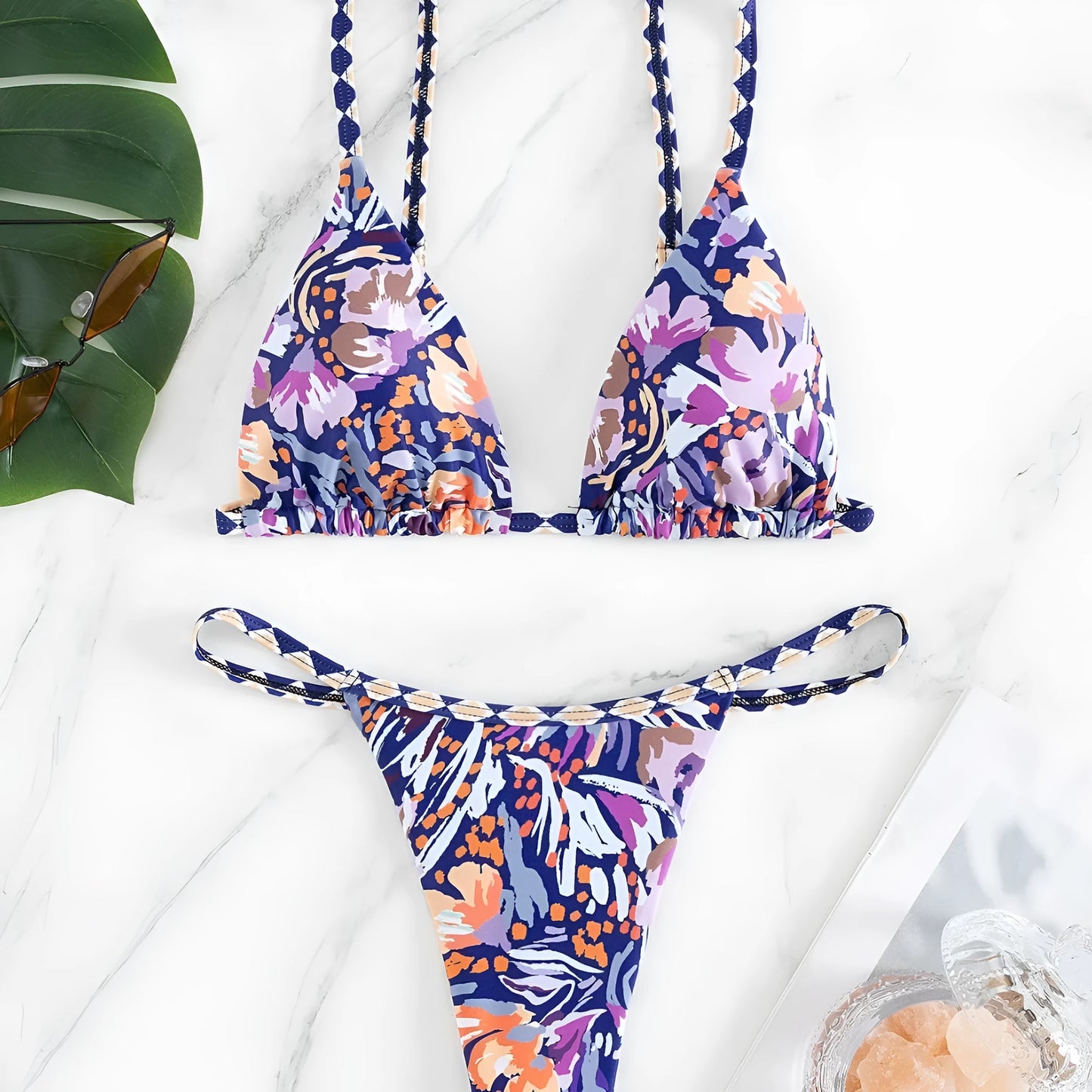 Women's floral print polyester swimsuit briefs with triangle bag design in available sizes