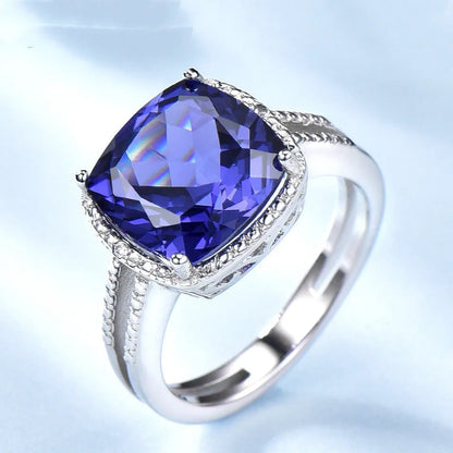 925 sterling silver ring with blue tanzanite gemstone, shown in UK sizes 6 to 10 for women's jewellery