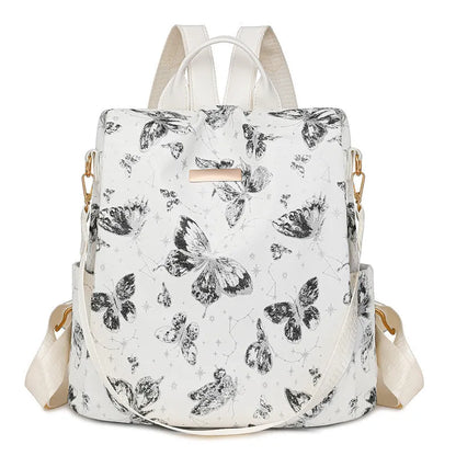 Butterfly printed large capacity PU backpack in various colours with sewing line details and an ergonomic back.