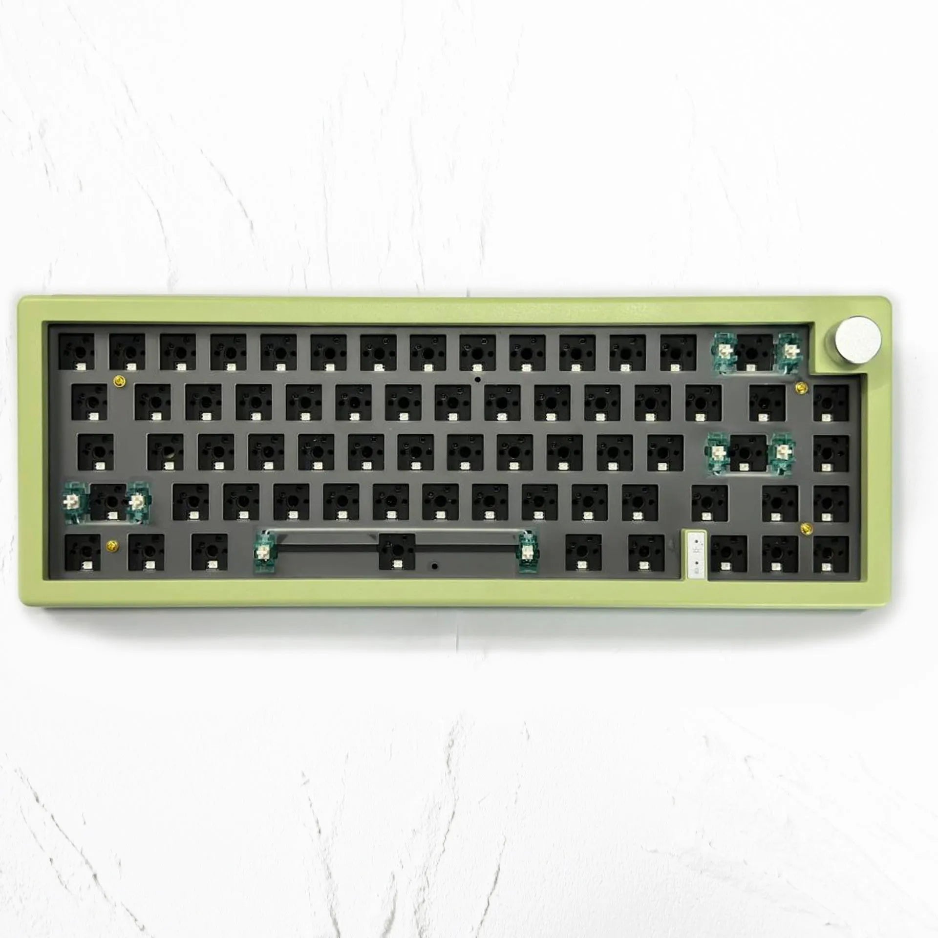 Customisable DIY mechanical keyboard kit with RGB backlighting and control knob, shown in multiple colour options