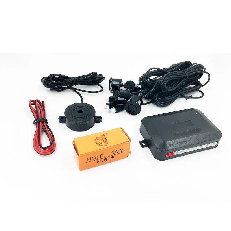 4-probe buzzer reversing radar kit with sensors, control module, and hole saw.