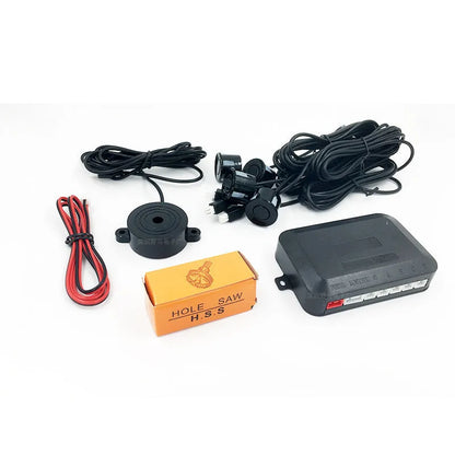4-probe buzzer reversing radar kit with sensors, control module, and hole saw.