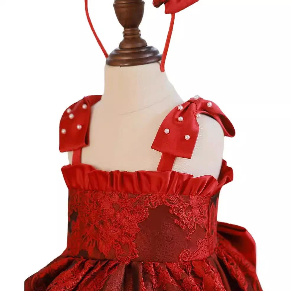 Red princess-style braces skirt for girls with adjustable straps on hanger