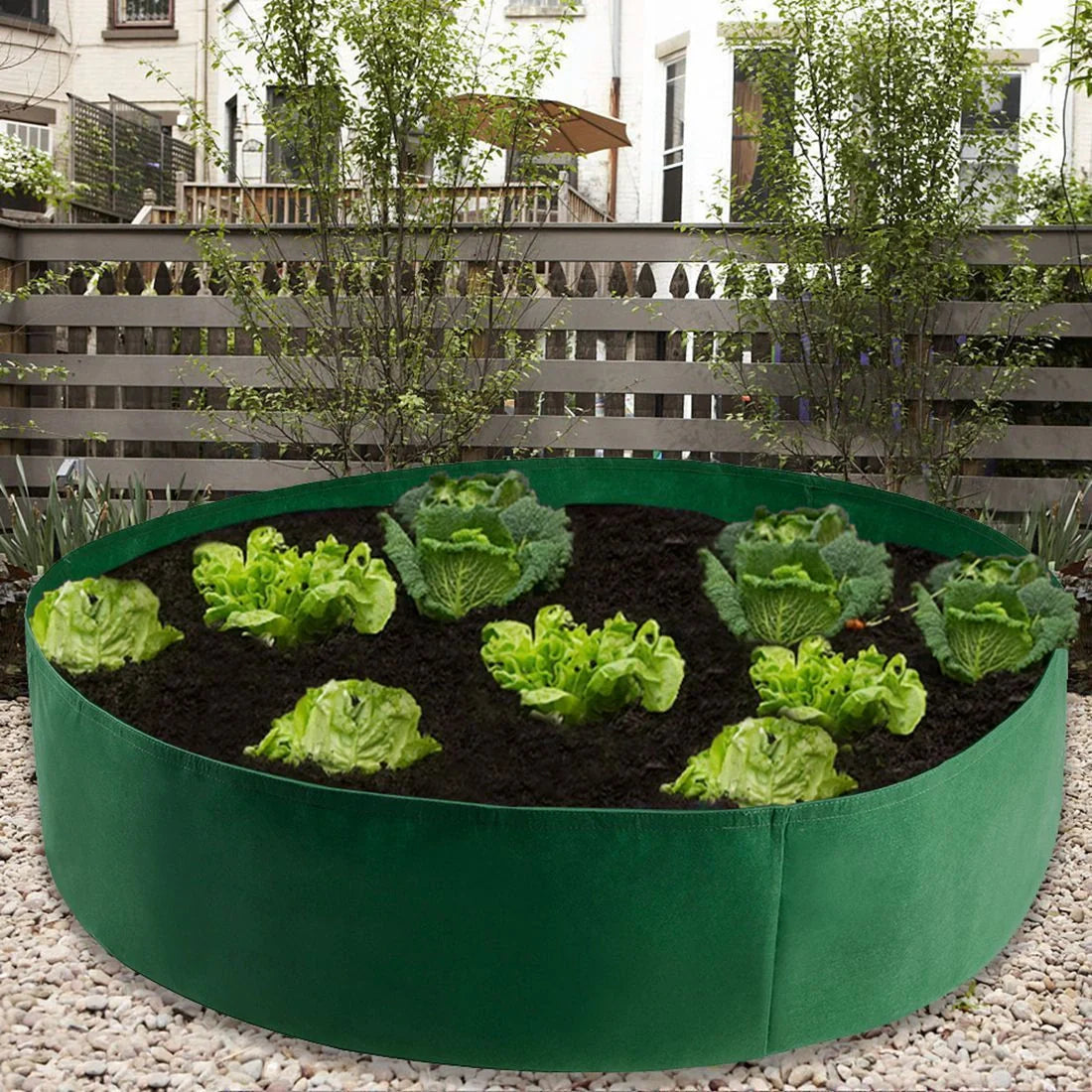Round fabric grow bags for plants with water-retaining felt material in black and green