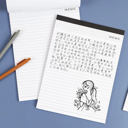A4 tearable notebook with grid-lined pages and wireless adhesive binding for clean page removal