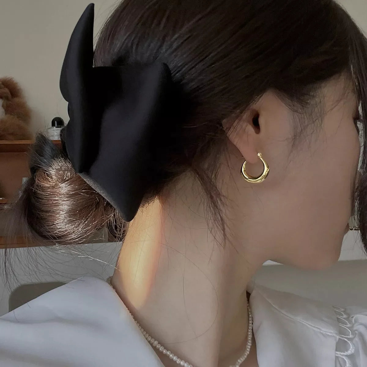 Small Fat Circle Ear Clip Bracelet in white gold and yellow gold colors