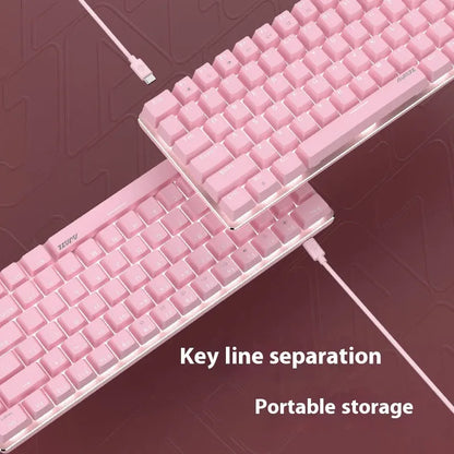 Pink mechanical keyboard with 82 keys and white backlight illumination on a desk.